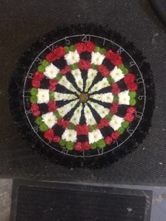 Dartboard by Amber Lily Flowers in Bristol