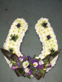 Horseshoe by Meades Florist