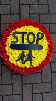Stop Sign by White Lotus Flowers